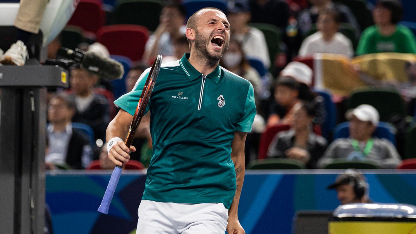 Dan Evans of Great Britain reacts during his match against Carlos Alcaraz of Spain in their men's singles round of 32 match on Day 8 of the 2023 Shanghai Rolex Masters at Qi Zhong Tennis Centre on October 09, 2023 in Shanghai, China. (Photo by Hugo Hu/Getty Images)